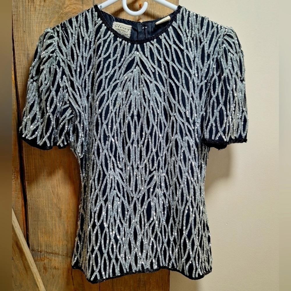 A vintage Stenay silk top with sequines in a ladies' size petite small.